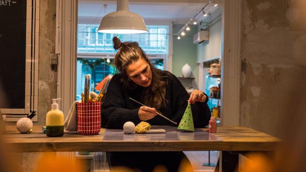 A woman crafting at Creative Space